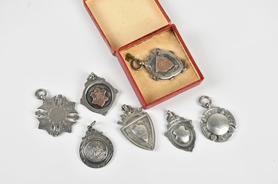 Lot 214 - A collection of seven George V and later...