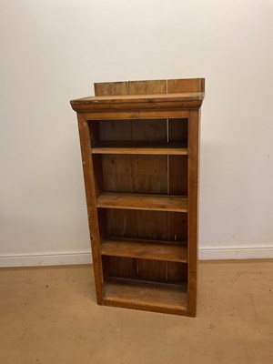 Lot 714 - A small pine book shelf, a converted cabinet...