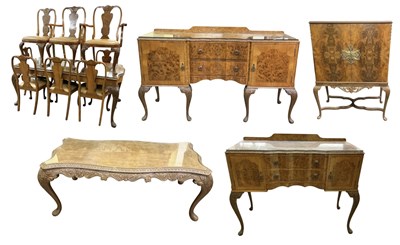 Lot 5 - An early 20th century burr walnut dining suite...