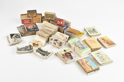 Lot 567 - A collection of cigarette cards, including...