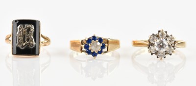 Lot 651 - A yellow gold unmarked black signet ring, size...