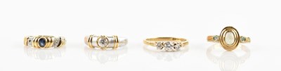 Lot 652 - A 9ct yellow gold dress rings, set with pale...