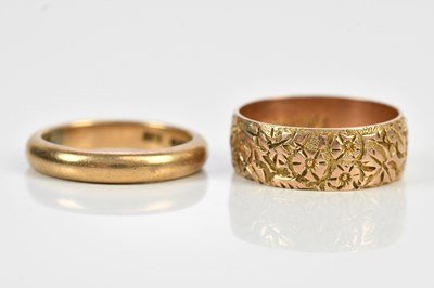 Lot 561 - A 9ct yellow gold wedding band, size P, and a...