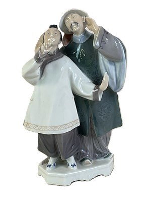 Lot 248 - ROYAL COPENHAGEN; a porcelain figure group,...
