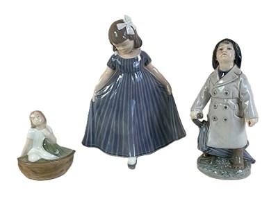 Lot 223 - ROYAL COPENHAGEN; three porcelain figures,...