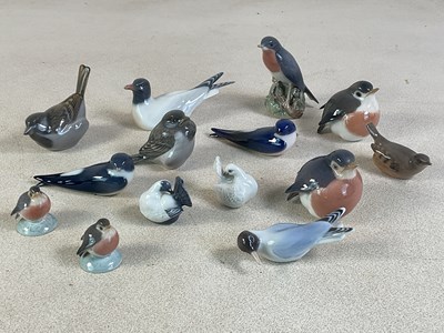 Lot 259 - ROYAL COPENHAGEN; fourteen porcelain models of...