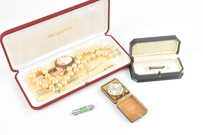 Lot 23 - An Art Deco white metal diamond brooch, set...