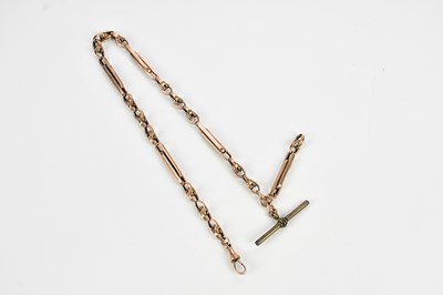 Lot 1166 - A rose metal trombone link Albert chain...