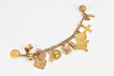 Lot 70 - A 9ct yellow gold curb link charm bracelet,...