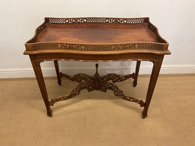 Lot 716 - A mahogany siver table, with raised gallery...