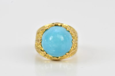 Lot 520 - A yellow metal and turquoise set dress ring,...
