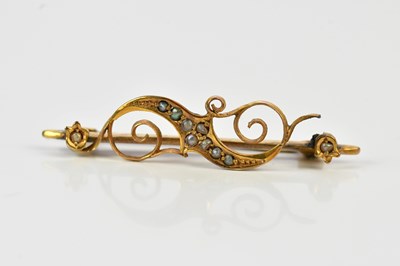 Lot 214 - A Victorian yellow metal seed pearl bar brooch,...