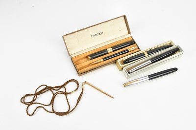 Lot 1202 - PARKER; a cased fountain pen and propelling...