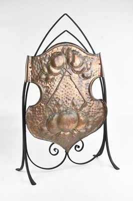 Lot 1290 - An Arts & Crafts copper and wrought iron fire...