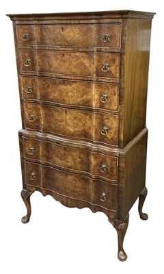 Lot 29 - A 1930s walnut chest on chest, with six long...
