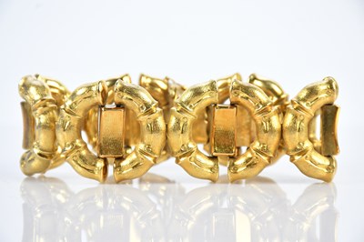 Lot 64 - A 14ct textured gold bamboo styled hinged...