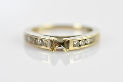 Lot 588 - An 18ct yellow gold and diamond ring,...