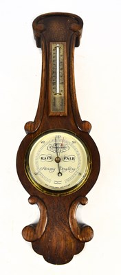 Lot 1516 - SHORT & MASON, LONDON; an oak wheel barometer of small proportions