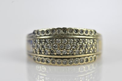 Lot 573 - An 18ct white gold and diamond dress ring set...