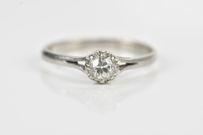 Lot 574 - An 18ct white gold diamond solitaire ring, the...