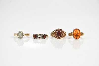 Lot 576 - Three 9ct yellow gold dress rings including a...