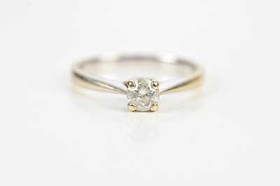 Lot 572 - An 18ct white gold diamond solitaire ring, the...