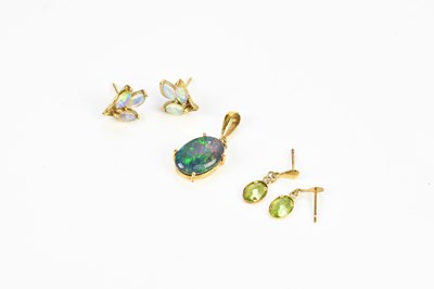 Lot 276 - A pair of yellow metal framed opal set ear...