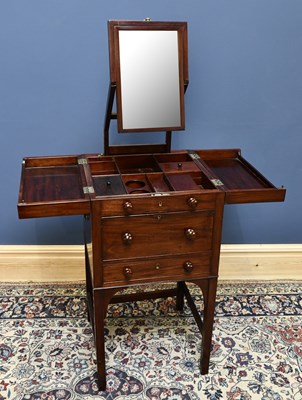 Lot 1547 - A late George III mahogany gentleman's wash...