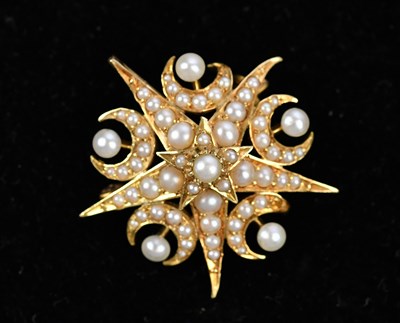 Lot 198 - A late Victorian yellow metal seed pearl star...