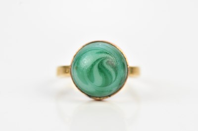 Lot 664 - An 18ct yellow gold dress ring set with a...