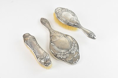 Lot 217 - An Edwardian Art Nouveau hallmarked silver...
