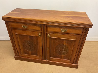 Lot 674 - A light oak side board unit, with two drawers...