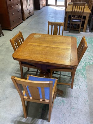 Lot 782 - An oak dining table, with decorative ball...