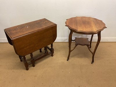 Lot 719 - An oak drop-leaf table with barley twist legs,...