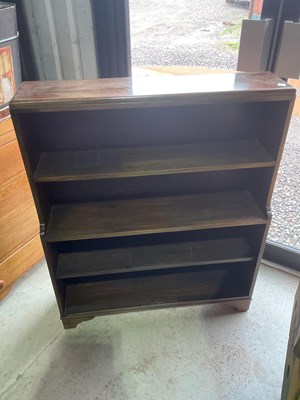 Lot 724 - A mahogany waterfall book case, height 110cm,...