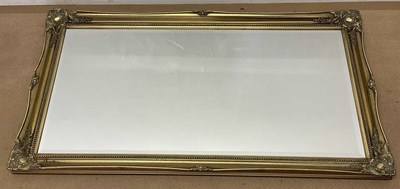 Lot 739 - A large modern gilt framed bevelled mirror,...