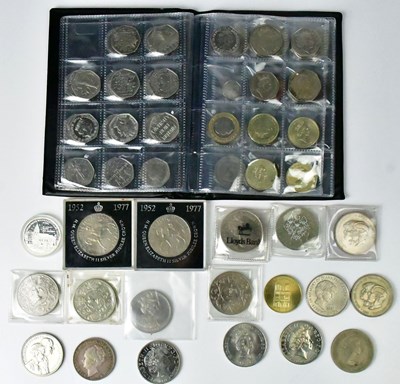 Lot 613 - A small coin folder containing mainly...