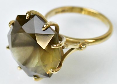 Lot 740 - A 9ct yellow gold cocktail ring set with a...