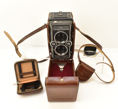 Lot 386 - A Rollei Magic medium format camera, in...