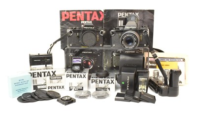 Lot 387 - PENTAX; two model LX camera bodies, one fitted...