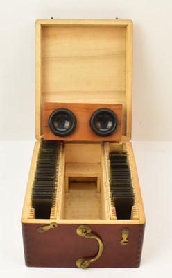 Lot 372 - A wooden cased stereoscope stereoscopic viewer,...