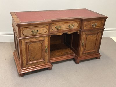 Lot 2029 - A late Victorian walnut inverted breakfront...