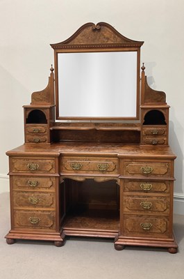 Lot 2023 - A Victorian figured walnut dressing table,...