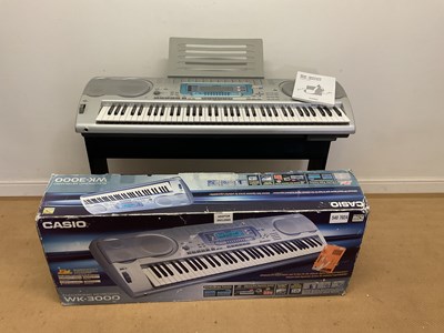 Lot 349 - CASIO; WK-3000 digital keyboard, with stand,...