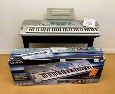 Lot 143 - CASIO; WK-3000 digital keyboard, with stand,...