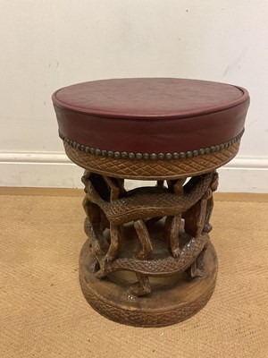 Lot 729 - An Asian style hardwood stool, decorated with...