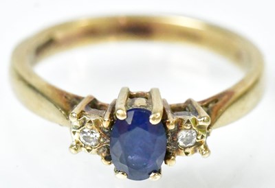 Lot 743 - A 9ct yellow gold ring set with a central...