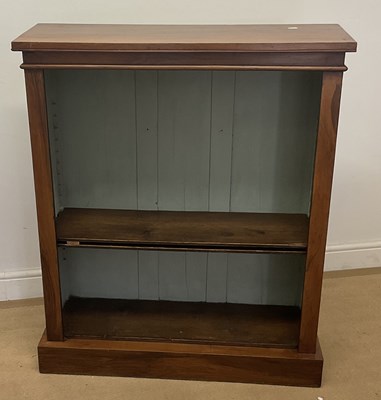Lot 766 - A walnut open adjustable two shelf bookcase,...