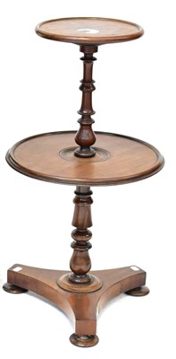 Lot 35 - A William IV walnut two-tier dumb waiter,...