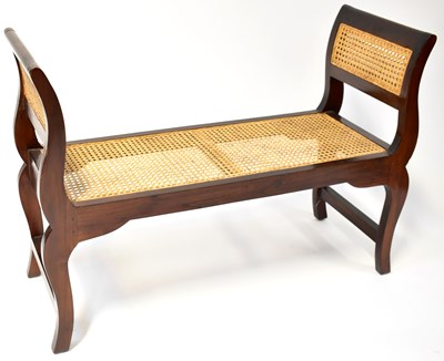 Lot 23 - A mahogany framed bergère caned window seat...